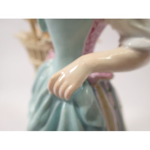 200 - A 19th century Meissen porcelain Cris de Paris figure of a pastry seller, 19cm tall, blue crossed sw... 