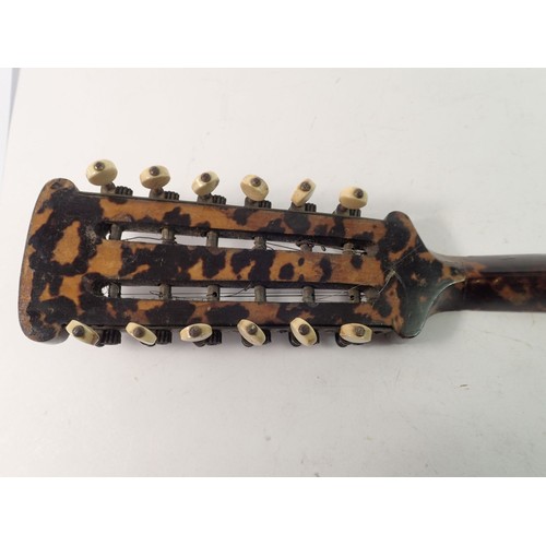 795 - A 19th century twelve string mandolin with a mother of pearl and abalone fingerboard, fluted rosewoo... 