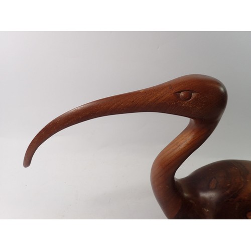 1007 - A large carved wood Ibis, 55cm long including beak