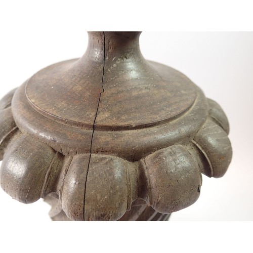 1354 - A set of four large carved wooden finials, 42cm