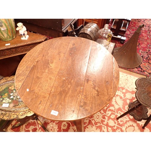 1382 - An 18th century elm topped cricket table with undertier and angular supports, 76cm diameter, 75cm hi... 