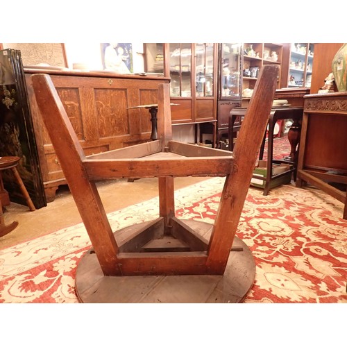 1382 - An 18th century elm topped cricket table with undertier and angular supports, 76cm diameter, 75cm hi... 