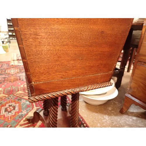 1394 - A 19th century mahogany decanter box on stand with concave moulded rise top all raised on four turne... 