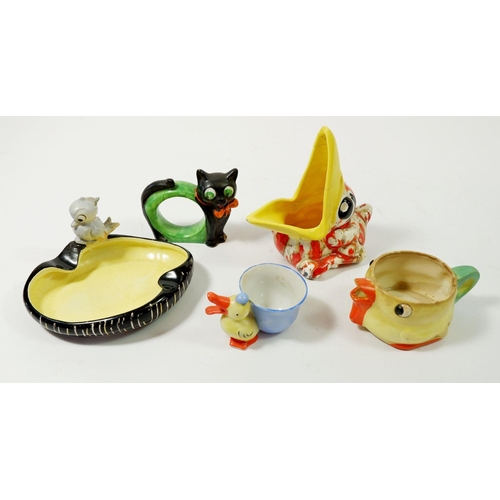 104 - A group of novelty Art Deco bird and cat form china including jug and napkin holder