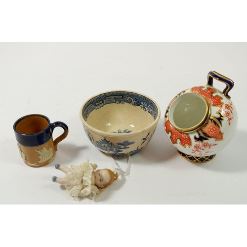 105 - A Doulton miniature tankard, a miniature dolls house doll and a miniature Royal Crown Derby salt pot