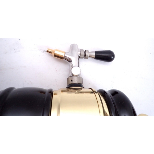 1096 - A Guinness black and gold bar pump with tap, 50cm tall