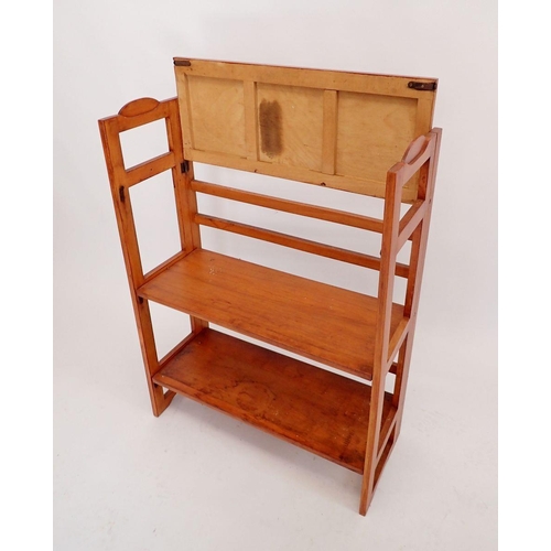 1097 - A stained wood folding bookcase, 70cm wide