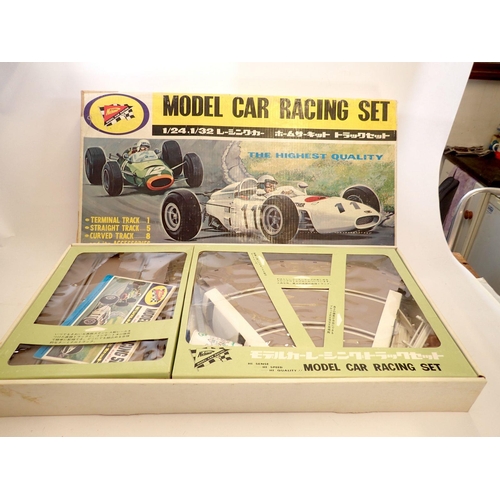 1107 - A Nichimo Japanese car racing set in two boxes