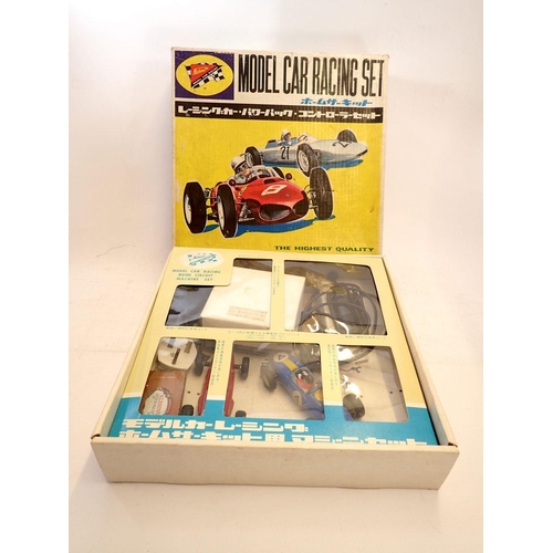 1107 - A Nichimo Japanese car racing set in two boxes