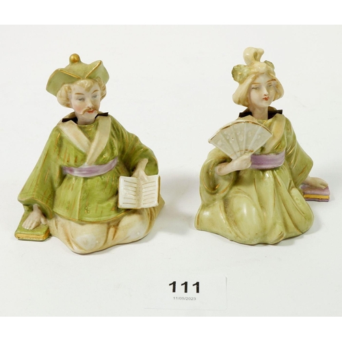 111 - A pair of bisque oriental style nodding head figures, 9cm tall