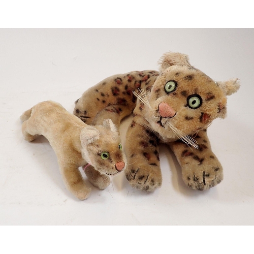 1117 - A Steiff leopard (ear detached no button) and lion cub