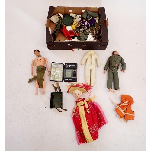 1125 - A quantity of Action men and dolls etc