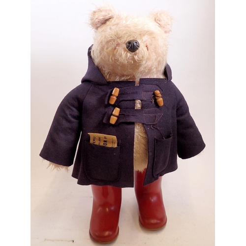 1129 - A Gabrielle Paddington Bear with torn label, 46cm tall