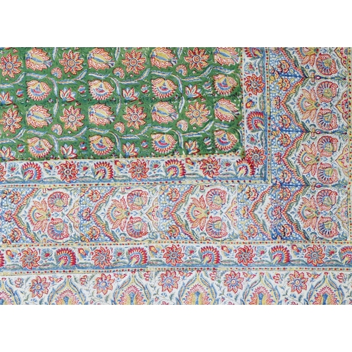 1143 - An embroidered satin tablecloth 125 x 125cm  with Egyptian motifs and a large Indian cotton bedsprea... 