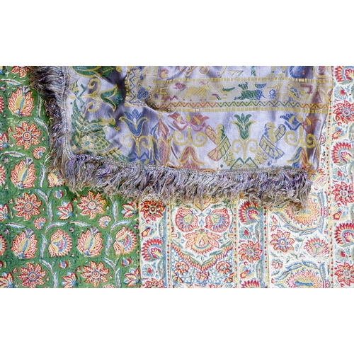 1143 - An embroidered satin tablecloth 125 x 125cm  with Egyptian motifs and a large Indian cotton bedsprea... 