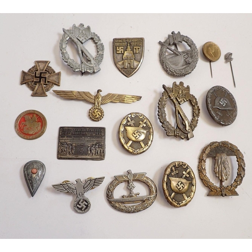 1157 - A collection of thirty two WWII German medals and badges including silver and enamel mother's badge,... 