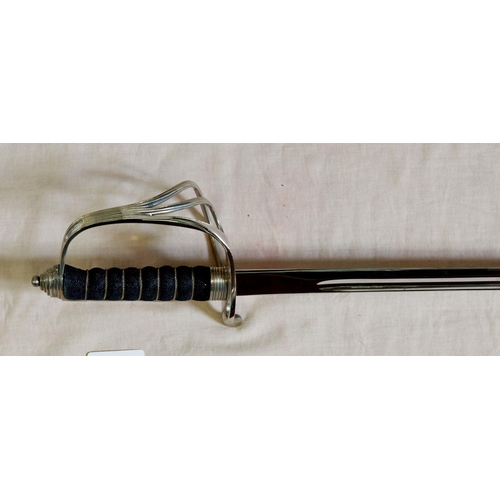 1171 - An officers dress sword with black shagreen handle and plated hand guard, blade 86cm