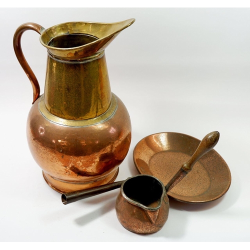 1183 - A Victorian large copper and brass jug, 41cm tall, an antique oval frying pan and sauce warmer