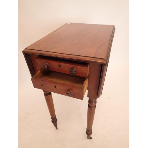 1184 - A Victorian mahogany dropleaf work table with two drawers and turned supports