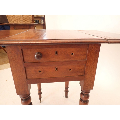 1184 - A Victorian mahogany dropleaf work table with two drawers and turned supports