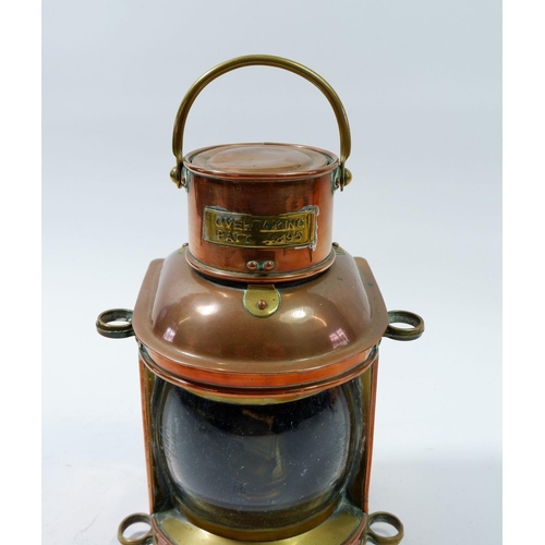 1190 - A copper ships 'Overtaking' lantern Patent No. 4895, 21cm tall