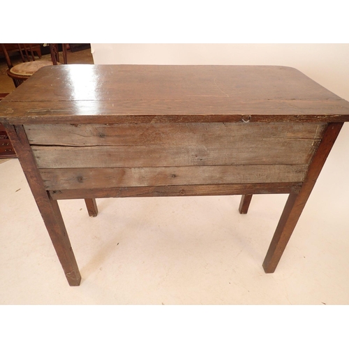 1192 - A Georgian oak low boy with frieze drawer and two small drawers, shaped side apron and square suppor... 