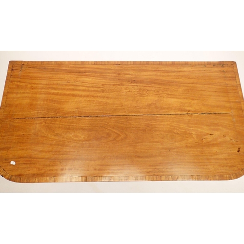 1200 - An early 19th century mahogany fold top card table on square tapered supports