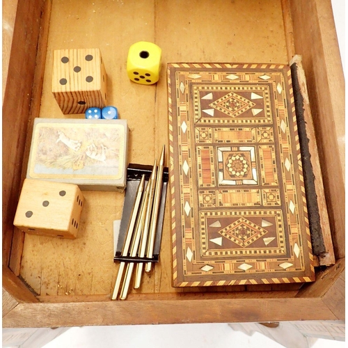 1209 - A Damascus marquetry fold top games table with card baize, backgammon and chess boards