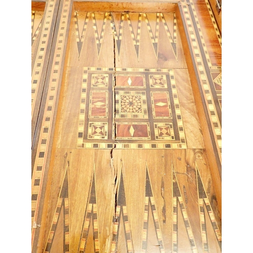 1209 - A Damascus marquetry fold top games table with card baize, backgammon and chess boards