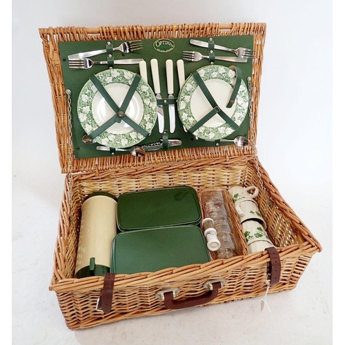 1210 - A vintage Optima wicker picnic set with china implements for four