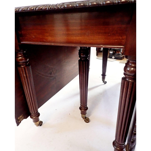 1217 - A good large early 19th century mahogany dining table with seven sections comprising: two D ends, a ... 