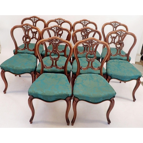 1218 - A set of ten Victorian mahogany dining chairs with carved scrollwork backs and cabriole supports