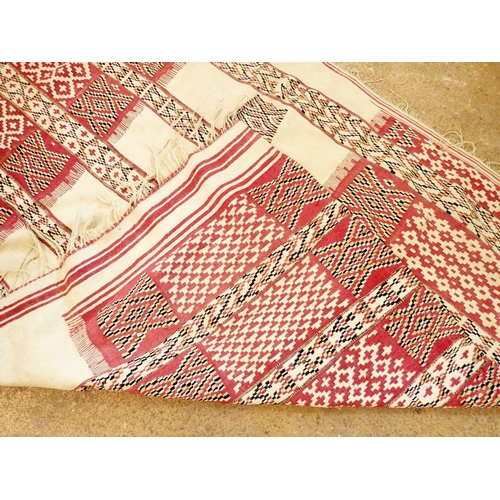 1227 - A Middle Eastern red and cream woven hanging, 186 x 127cm