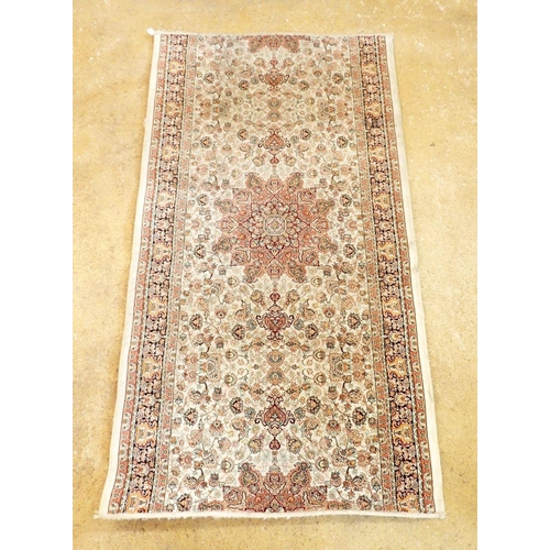 1228 - A Mahris Persian style machine made runner with all over floral decoration, cut down, 181 x 99cm