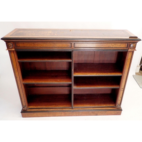 1235 - A pair of fine of Victorian oak and ebonized dwarf bookcases with leather inset tops, adjustable she... 