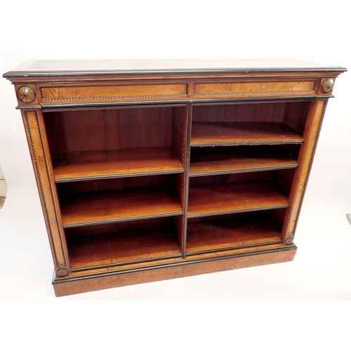 1235 - A pair of fine of Victorian oak and ebonized dwarf bookcases with leather inset tops, adjustable she... 