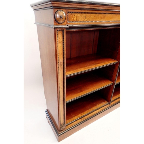 1235 - A pair of fine of Victorian oak and ebonized dwarf bookcases with leather inset tops, adjustable she... 