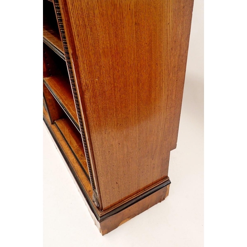 1235 - A pair of fine of Victorian oak and ebonized dwarf bookcases with leather inset tops, adjustable she... 