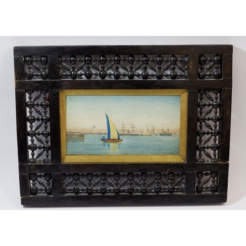 1279 - A watercolour Egypt harbour scene, monogramed F.S.L, dated 1908 in decorative ebonised spindle turne... 