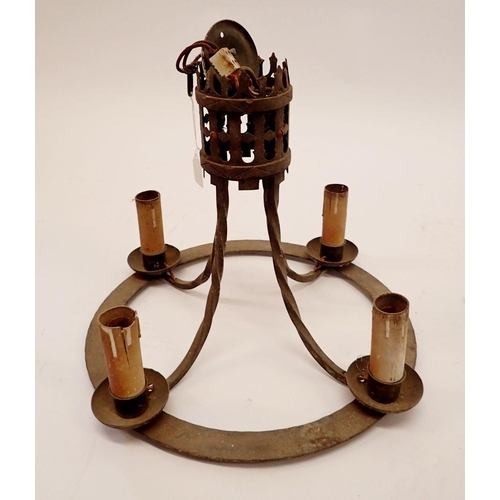 1292 - A medieval style cast iron circular light fitting, 39.5cm diameter