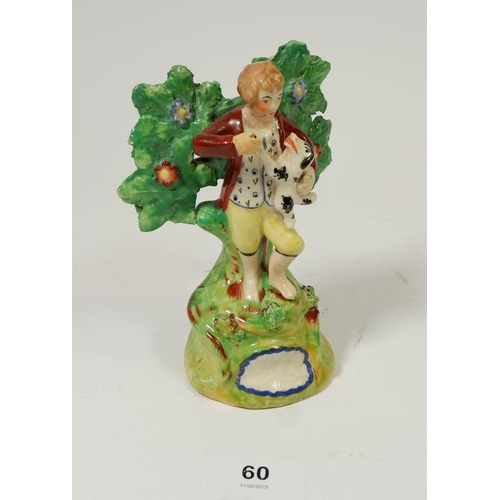 60 - A Victorian Staffordshire bocage group boy with dog, 14.5cm tall