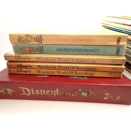 690 - A quantity of 1970's Disneyland, Donald and Mickey comics and five Walt Disney books