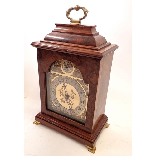 736 - An Elliott walnut Georgian style mantel clock, 26cm tall