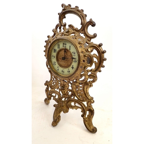 739 - A 19th century French brass scrollwork easel mantel clock, 27cm tall