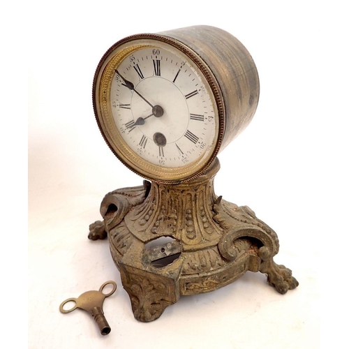 740 - A gilt metal drum cased mantel clock on bracket base, 21cm tall