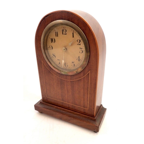 742 - An Edwardian mahogany arch top mantel clock, 22cm tall