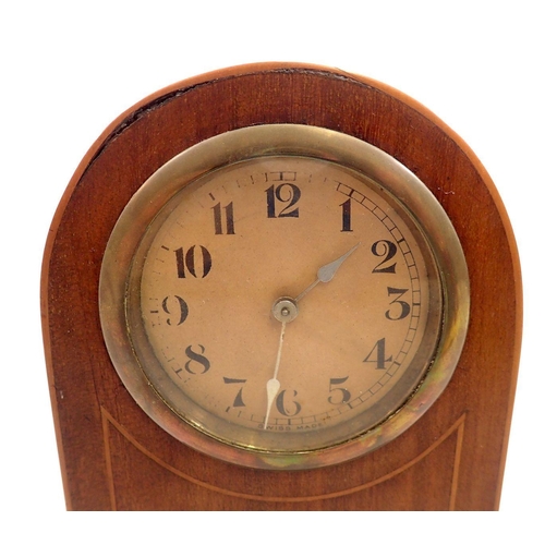 742 - An Edwardian mahogany arch top mantel clock, 22cm tall