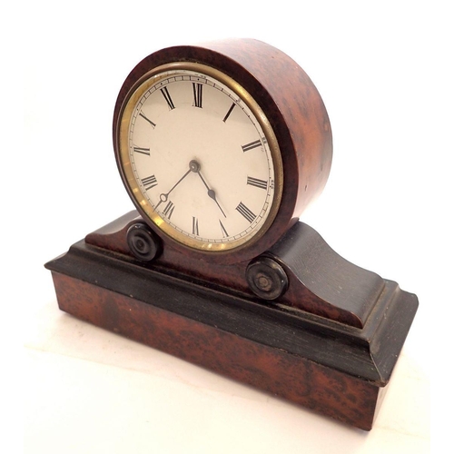 744 - An early 19th century burr walnut and ebony circular face mantel clock, 18cm tall