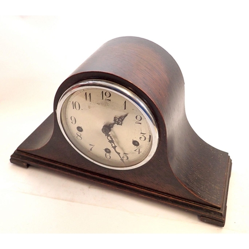 745 - A 1930's oak mantel clock with Westminster chime, 24cm tall