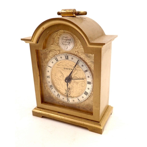 748 - A Swiza brass arch top alarm clock, 9cm tall